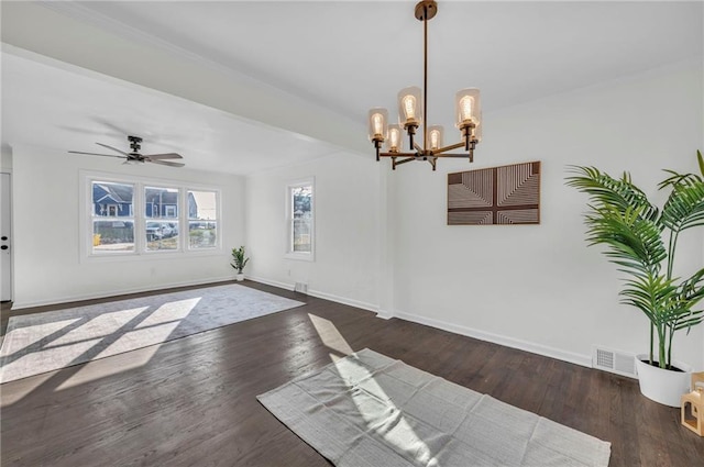 interior space with dark hardwood / wood-style floors and ceiling fan with notable chandelier