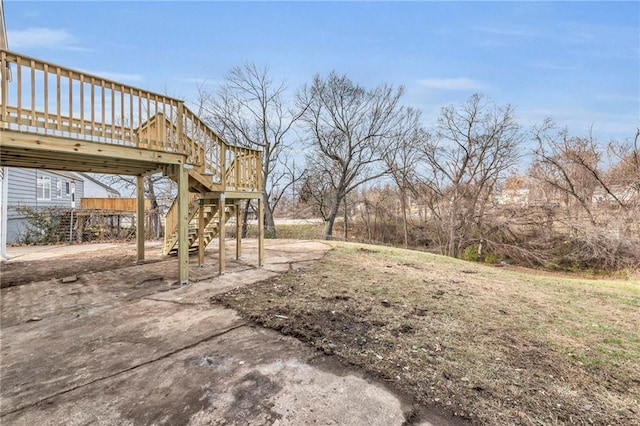 view of yard with a wooden deck