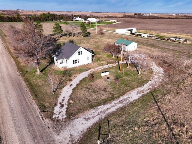 birds eye view of property featuring a rural view