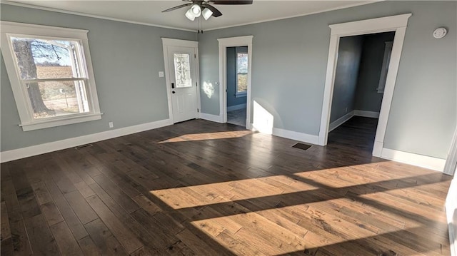 foyer featuring ceiling fan, dark hardwood / wood-style flooring, and crown molding