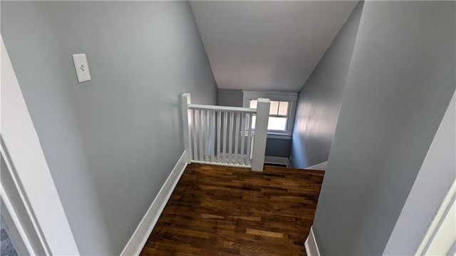 hall with dark hardwood / wood-style floors