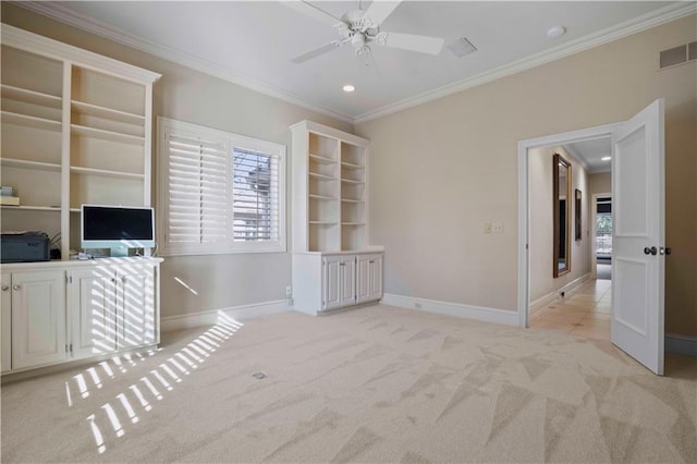 interior space featuring crown molding, plenty of natural light, and ceiling fan