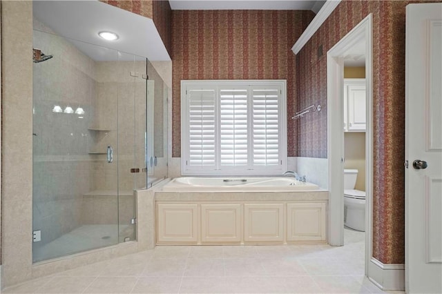 bathroom with tile patterned floors, plus walk in shower, and toilet