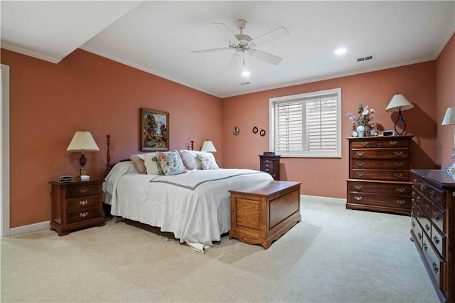 carpeted bedroom with crown molding and ceiling fan