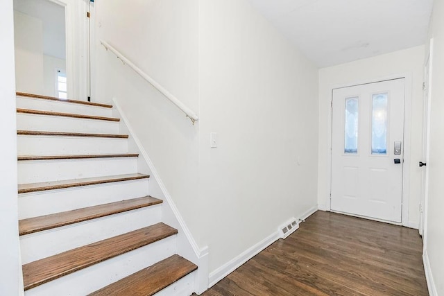 foyer featuring dark hardwood / wood-style floors