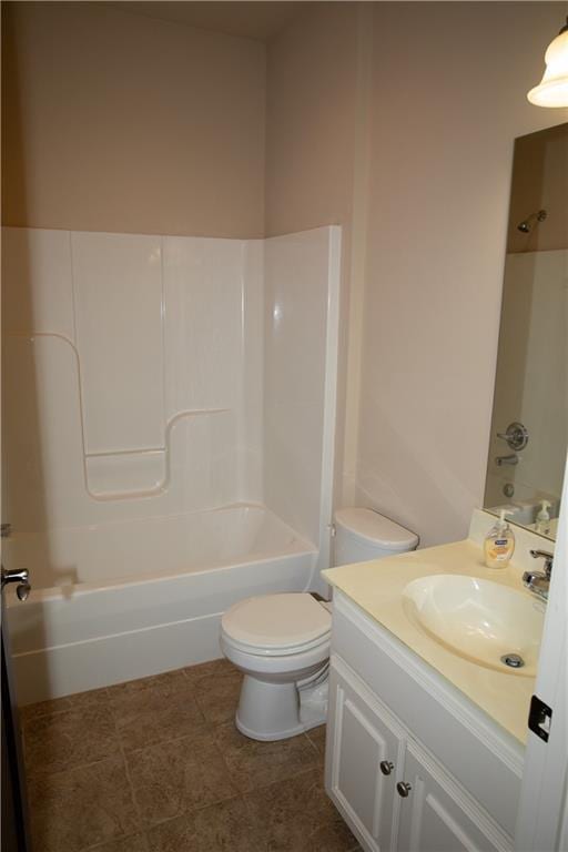 full bathroom featuring tile patterned flooring, vanity, toilet, and tub / shower combination