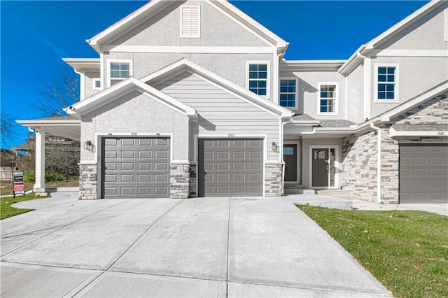 view of front of property with a garage