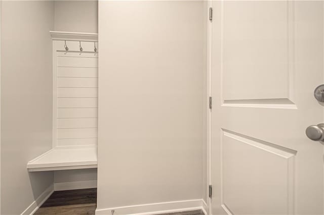 mudroom with dark hardwood / wood-style flooring