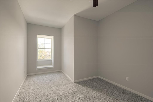 spare room featuring carpet flooring