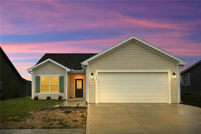 ranch-style home featuring a garage