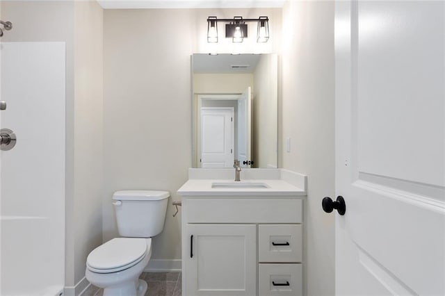 1316 N Holland Ct, Independence, MO 64056 - bathroom featuring vanity, toilet, baseboards, a shower, and tile patterned floors