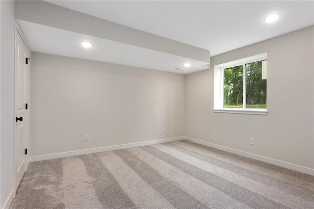 1316 N Holland Ct, Independence, MO 64056 - spare room featuring recessed lighting, baseboards, and light colored carpet