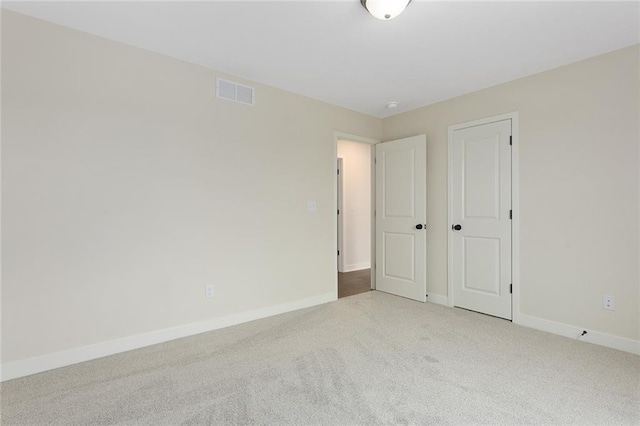 1316 N Holland Ct, Independence, MO 64056 - unfurnished bedroom with carpet and baseboards