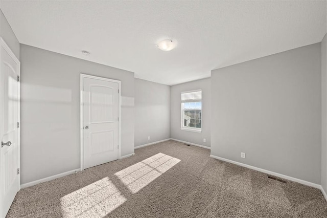 unfurnished bedroom featuring carpet floors