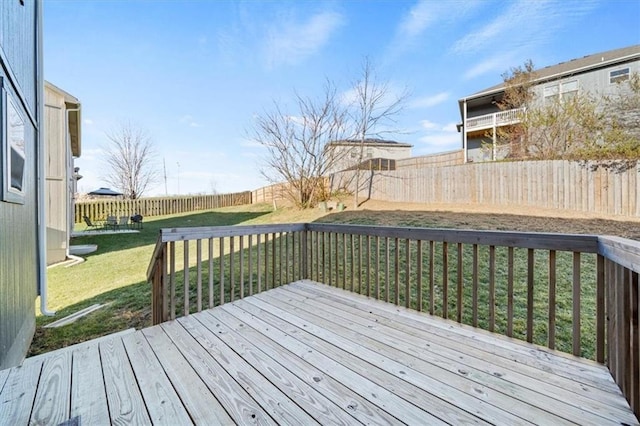 wooden deck with a yard