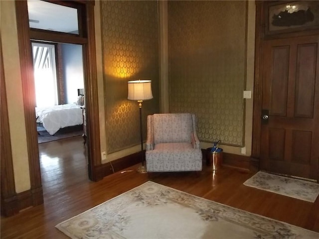 living area featuring dark wood-type flooring