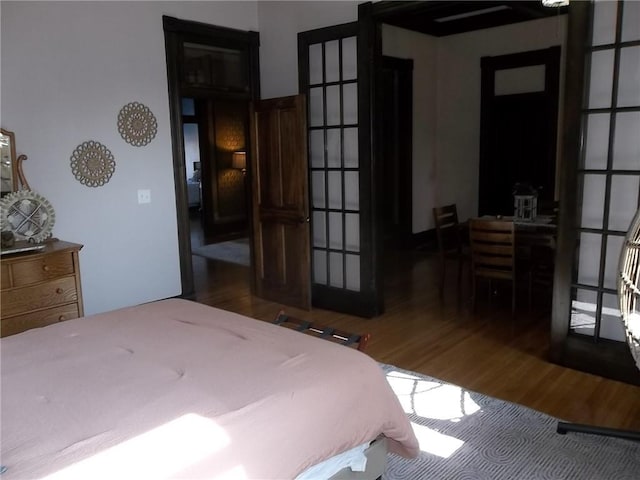 bedroom featuring dark hardwood / wood-style floors