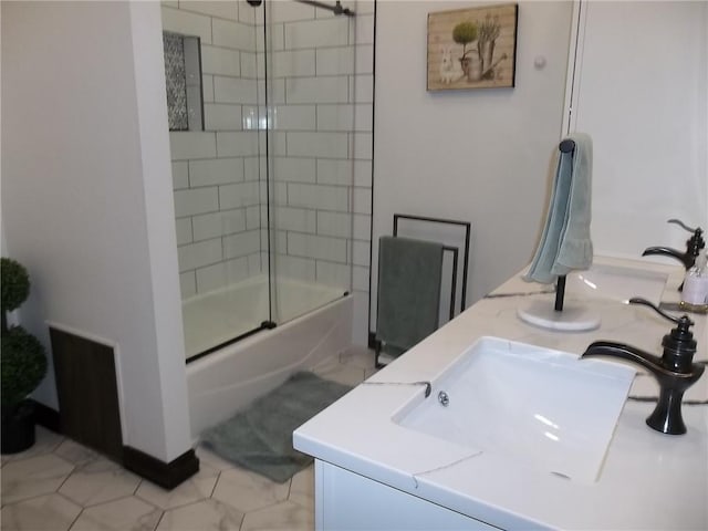 bathroom with enclosed tub / shower combo and vanity