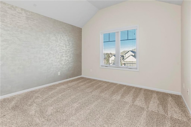 9509 W 164th St, Stilwell, KS 66085 - carpeted empty room with vaulted ceiling and baseboards