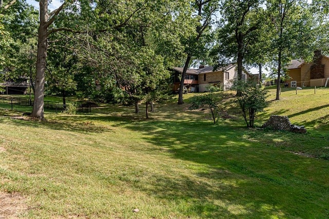 view of yard with fence