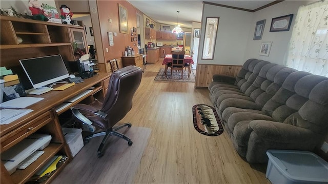 423 Elm St, Mound City, KS 66056 - office featuring wood walls, ornamental molding, and light wood-type flooring