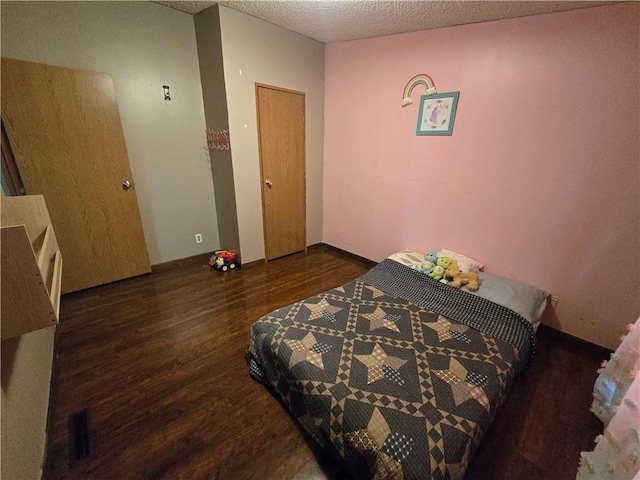 423 Elm St, Mound City, KS 66056 - bedroom with wood finished floors