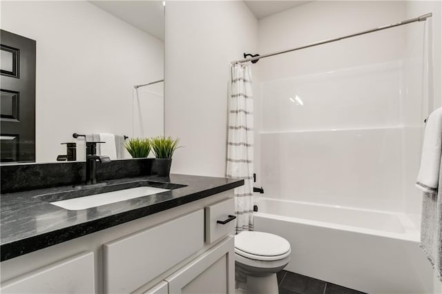 full bathroom featuring shower / tub combo, vanity, toilet, and tile patterned floors