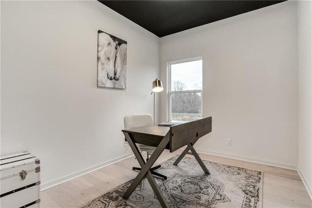 office space featuring light wood-type flooring