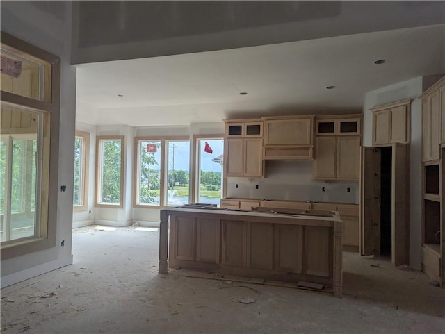 14709 Fairway St, Leawood, KS 66224 - kitchen featuring a center island and baseboards