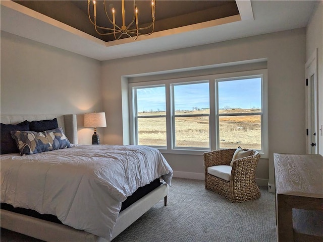 14709 Fairway St, Leawood, KS 66224 - bedroom with a chandelier, a tray ceiling, and carpet floors