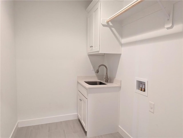 14709 Fairway St, Leawood, KS 66224 - laundry room with hookup for a washing machine and cabinet space