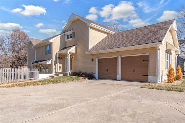 view of side of property with a garage