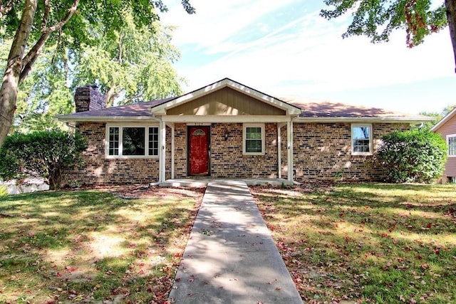 ranch-style house with a front yard