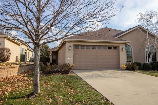 single story home with a garage