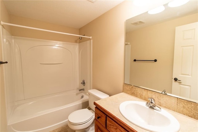 full bathroom with vanity, toilet, and shower / bathtub combination