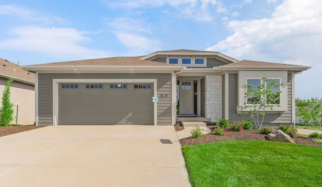 4102 W 158th Ter, Overland Park, KS 66224 - prairie-style home featuring driveway, a garage, and a front yard