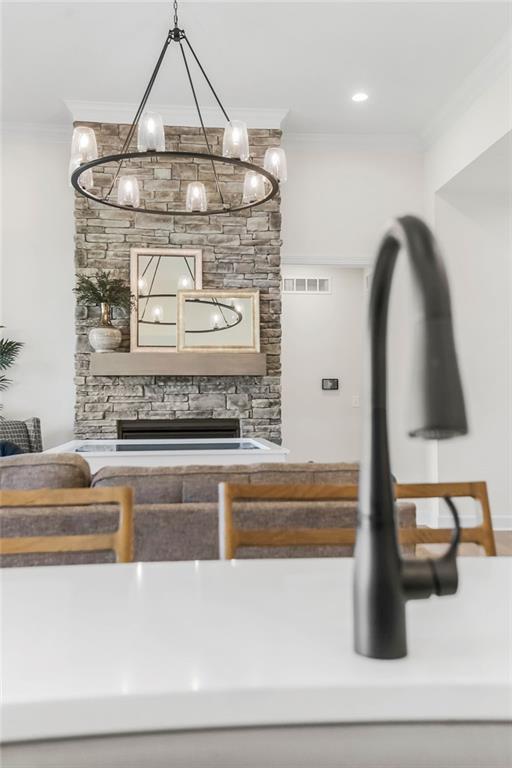 4102 W 158th Ter, Overland Park, KS 66224 - detailed view of ornamental molding and a chandelier