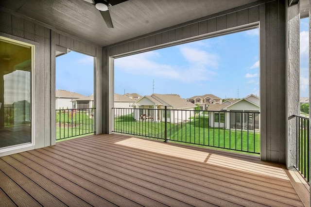 4102 W 158th Ter, Overland Park, KS 66224 - wooden terrace with a ceiling fan, a residential view, and a lawn