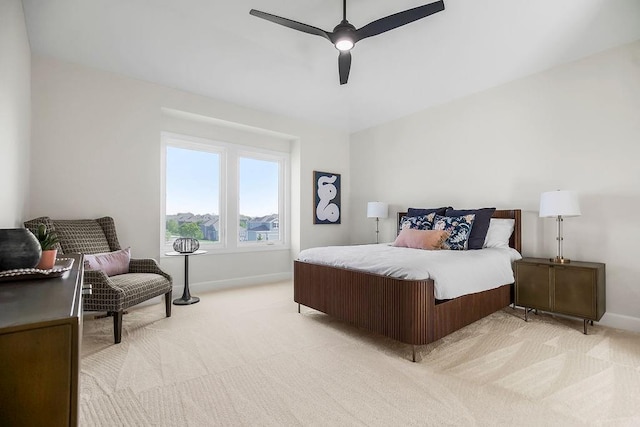 4102 W 158th Ter, Overland Park, KS 66224 - bedroom featuring light colored carpet, baseboards, and a ceiling fan