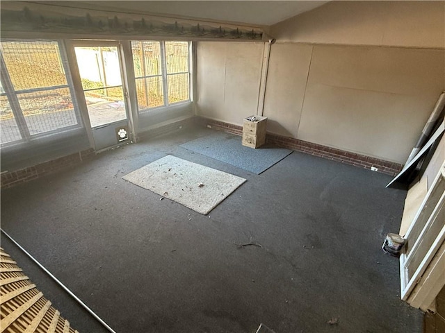 2123 N 8th St, Independence, KS 67301 - unfurnished sunroom with lofted ceiling