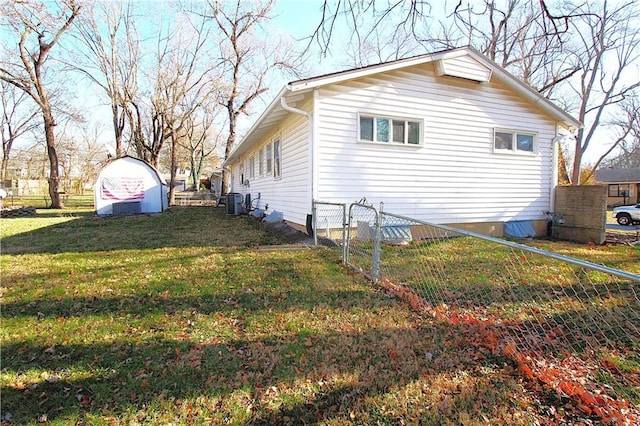 view of property exterior featuring a lawn