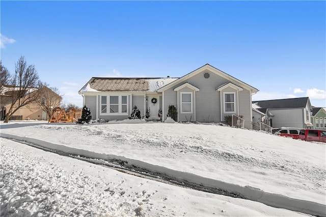 view of snow covered property