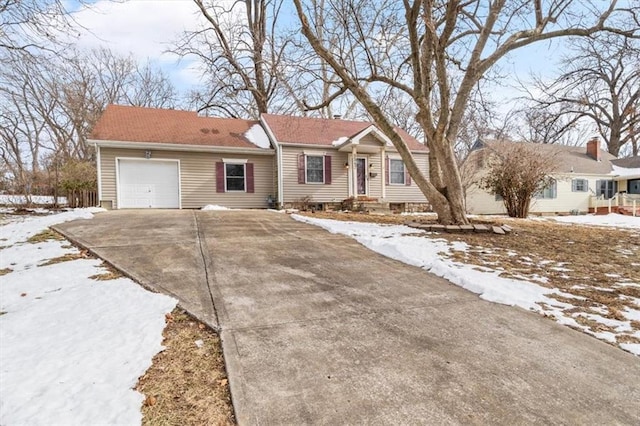 single story home featuring a garage