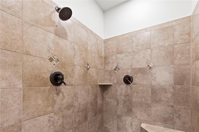 details with a tile shower