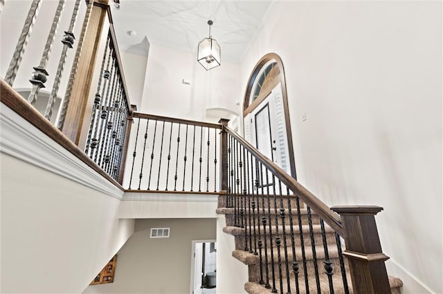 stairway with a high ceiling