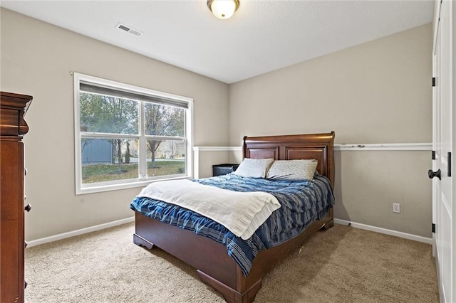 bedroom featuring carpet