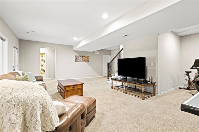 living room featuring light colored carpet