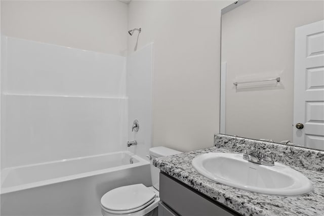 full bathroom with toilet, vanity, and bathing tub / shower combination