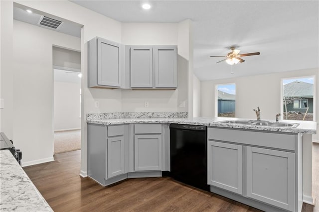 kitchen with gray cabinetry, dishwasher, sink, dark wood-type flooring, and kitchen peninsula