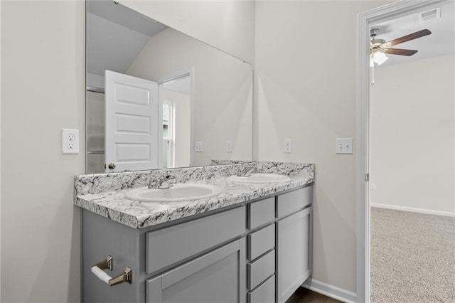 bathroom featuring vanity and ceiling fan